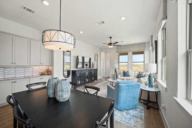 dining area with ceiling fan and plenty of natural light