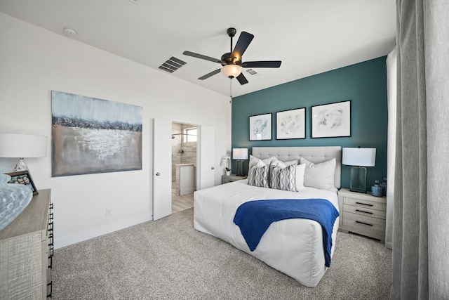 carpeted bedroom featuring connected bathroom and ceiling fan