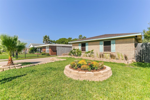 ranch-style house with a front lawn