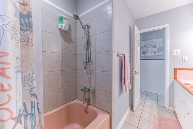 bathroom featuring vanity, tile patterned floors, and shower / bath combo with shower curtain