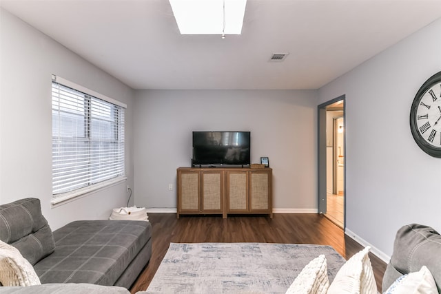 living room featuring dark hardwood / wood-style floors