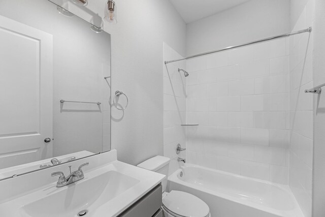 full bathroom featuring vanity,  shower combination, and toilet