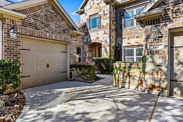 view of front of property with a garage