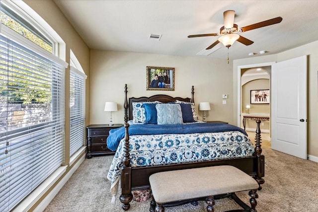 carpeted bedroom with ceiling fan