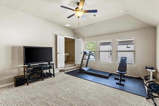 exercise area with ceiling fan, carpet floors, and vaulted ceiling