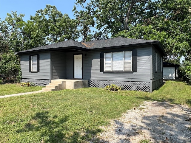 view of front of property with a front lawn