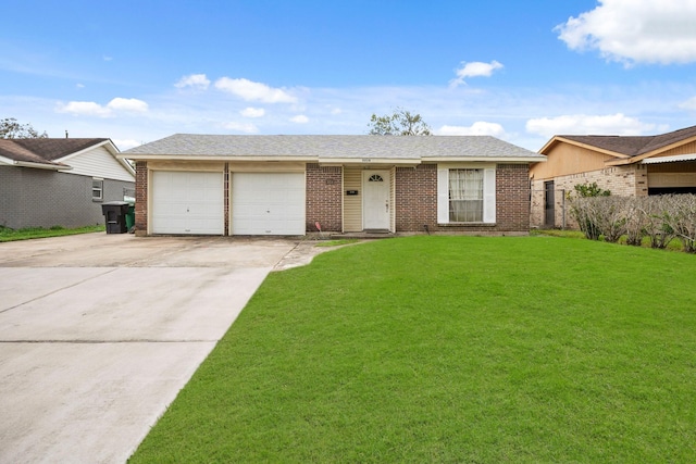 ranch-style home featuring a garage and a front yard