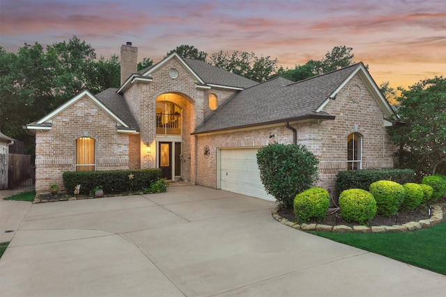 view of front of property with a garage