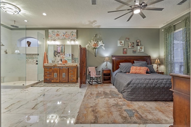 bedroom featuring a textured ceiling, ceiling fan, and ornamental molding