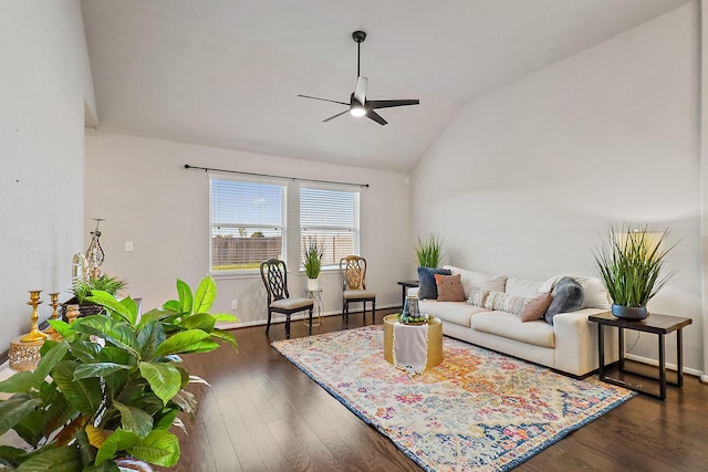 living room featuring lofted ceiling, ceiling fan, and dark hardwood / wood-style floors