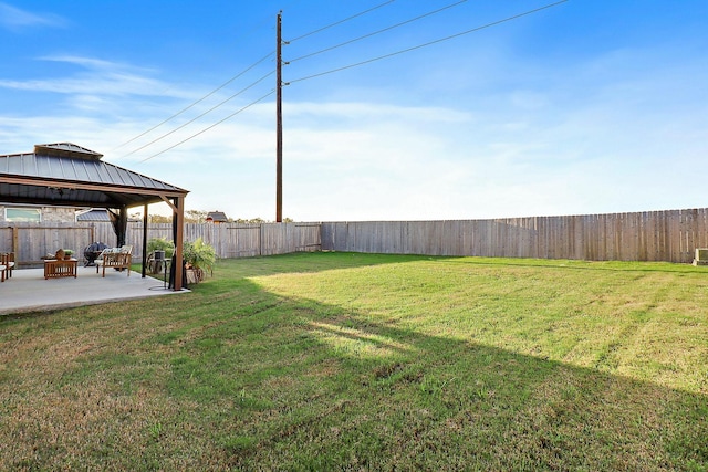 view of yard with a gazebo and a patio