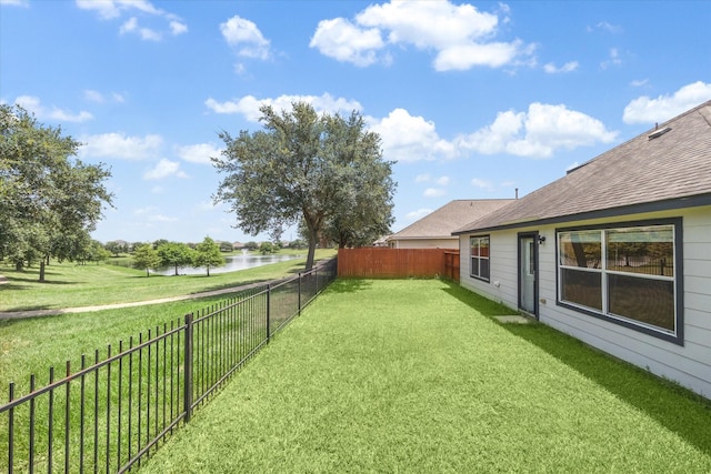 view of yard featuring a water view