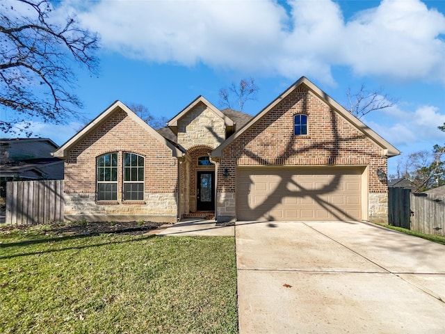 434 Carriage Trl, Conroe, TX 77316 - view of front facade with a front lawn