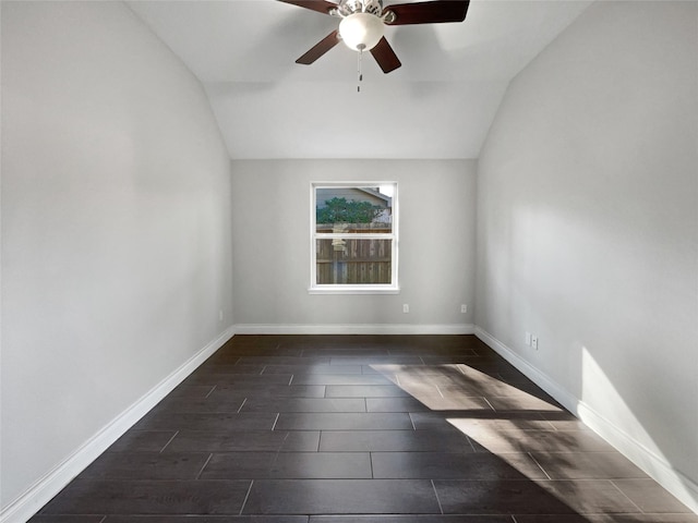 unfurnished room featuring ceiling fan and lofted ceiling