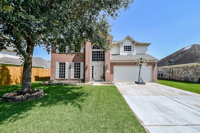 view of front of home with a garage and a front yard