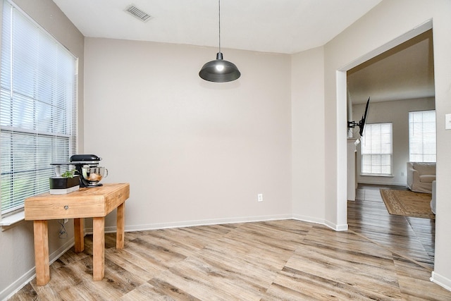 dining room with light wood-type flooring