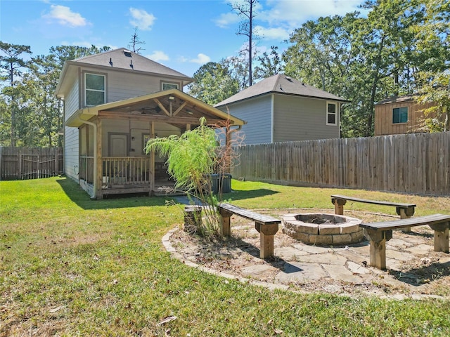 view of yard featuring a fire pit