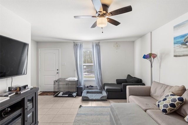 tiled living room with ceiling fan