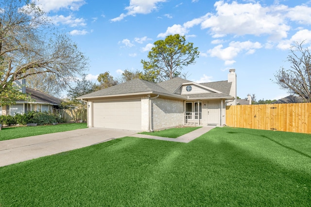 single story home with a garage and a front lawn