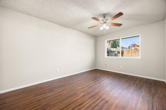 unfurnished room with a textured ceiling, dark hardwood / wood-style flooring, and ceiling fan