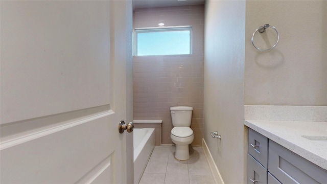 bathroom featuring tile patterned flooring, vanity, and toilet