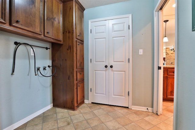 washroom featuring cabinets and hookup for a washing machine