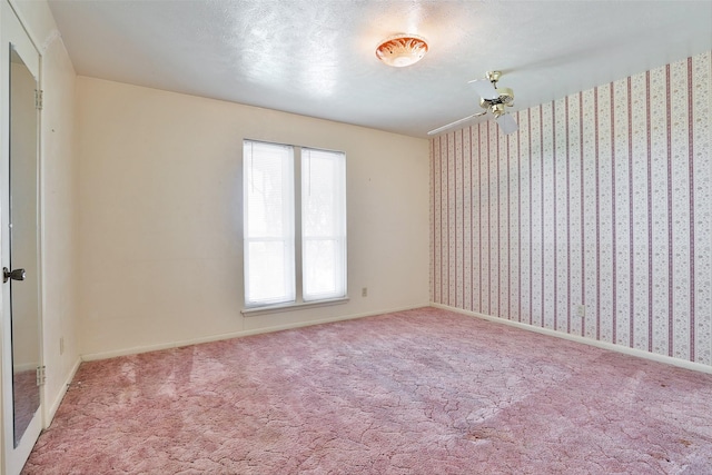 unfurnished room with carpet flooring