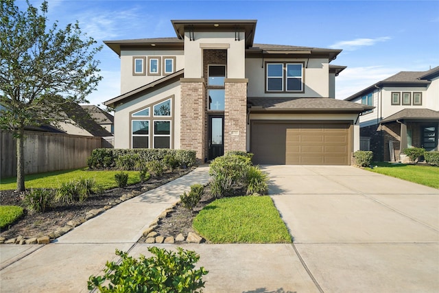 prairie-style home featuring a garage