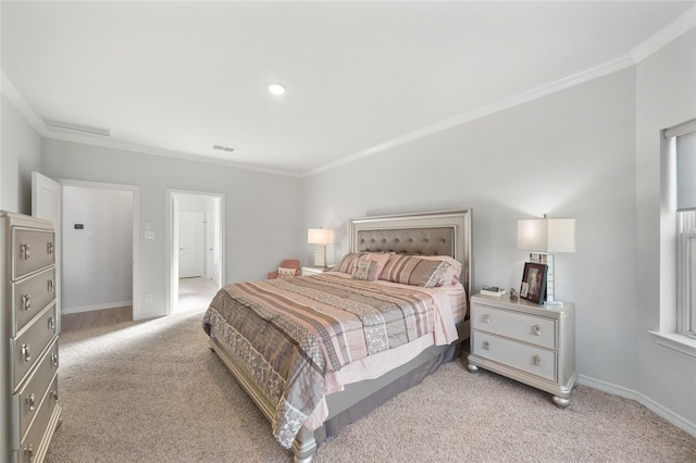 carpeted bedroom with crown molding