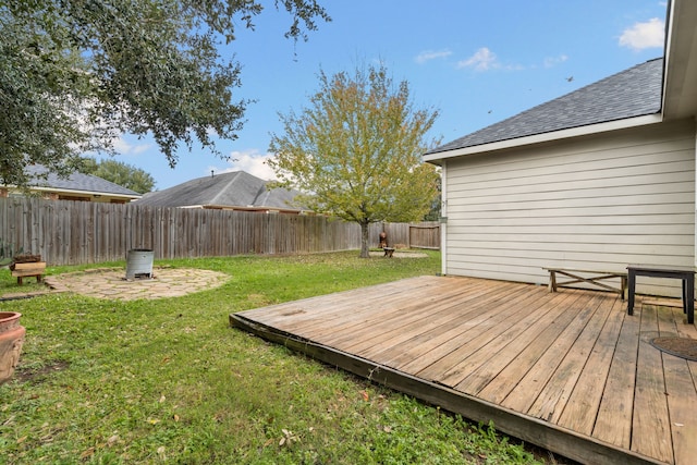 view of yard with a wooden deck