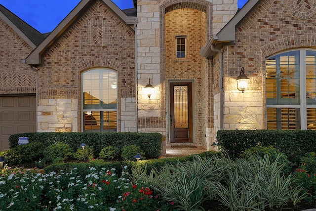 property entrance featuring a garage