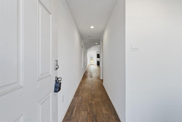 hall featuring dark hardwood / wood-style floors