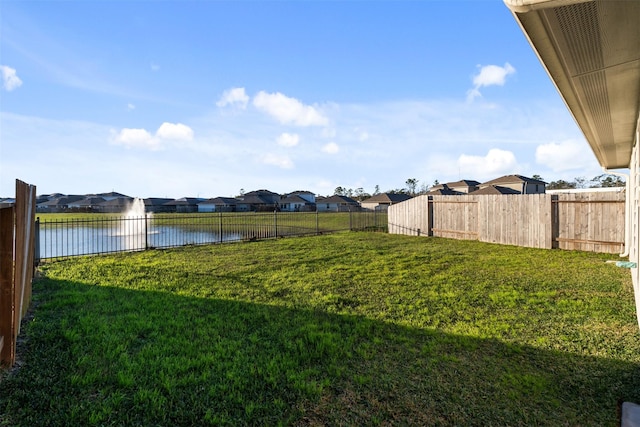 view of yard with a water view