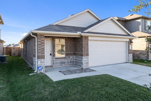 single story home featuring cooling unit, a garage, and a front yard