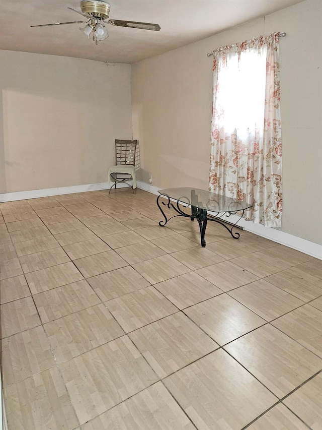 unfurnished room featuring ceiling fan