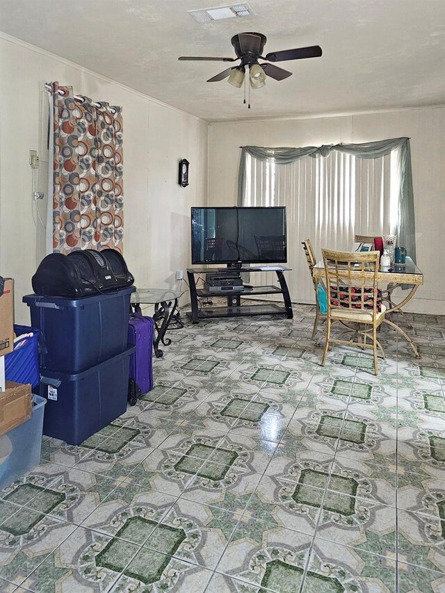 living room with ceiling fan