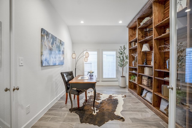 office with lofted ceiling and french doors