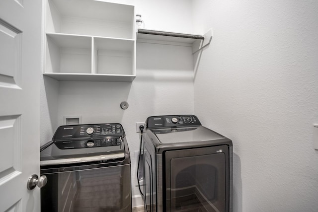 laundry room with washer and dryer