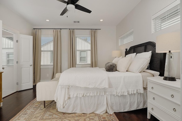 bedroom with hardwood / wood-style floors and ceiling fan