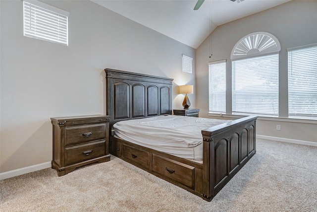 bedroom featuring light colored carpet, ceiling fan, and lofted ceiling