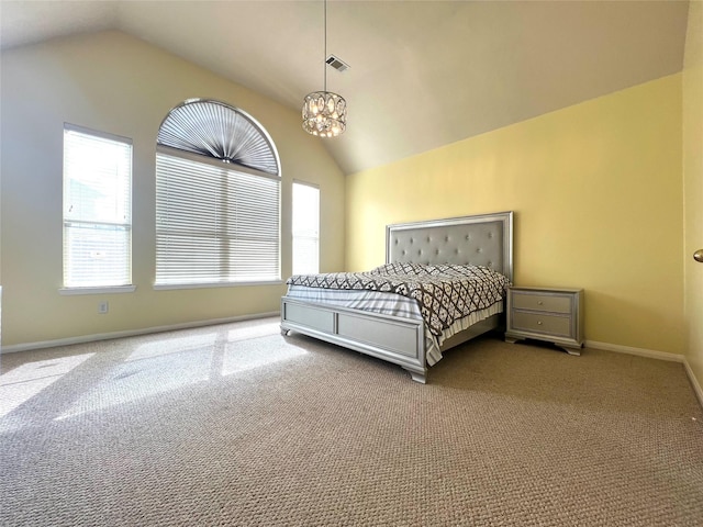 bedroom featuring carpet floors, a chandelier, and vaulted ceiling