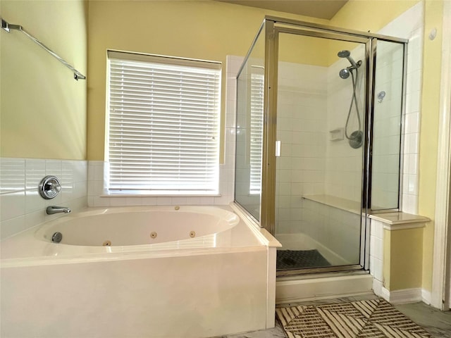 bathroom featuring plus walk in shower