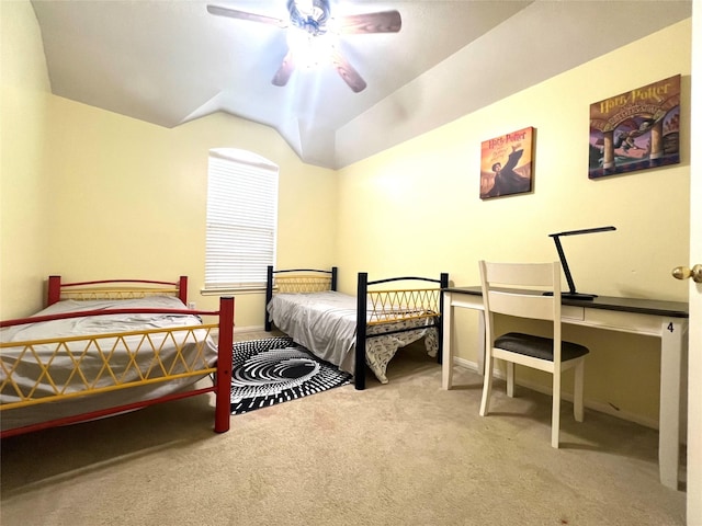 carpeted bedroom with ceiling fan and lofted ceiling