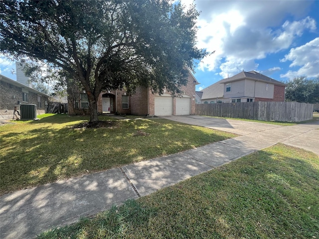 view of front facade featuring central AC, a front lawn, and a garage