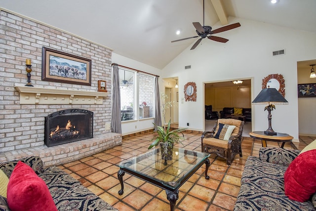 tiled living room featuring ceiling fan, beam ceiling, a fireplace, and high vaulted ceiling