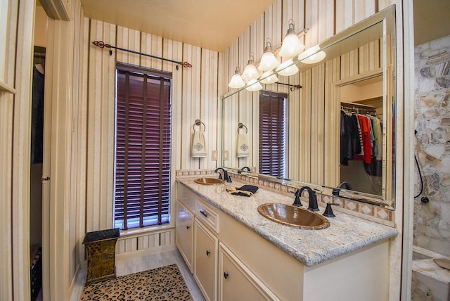 bathroom featuring vanity and hardwood / wood-style flooring