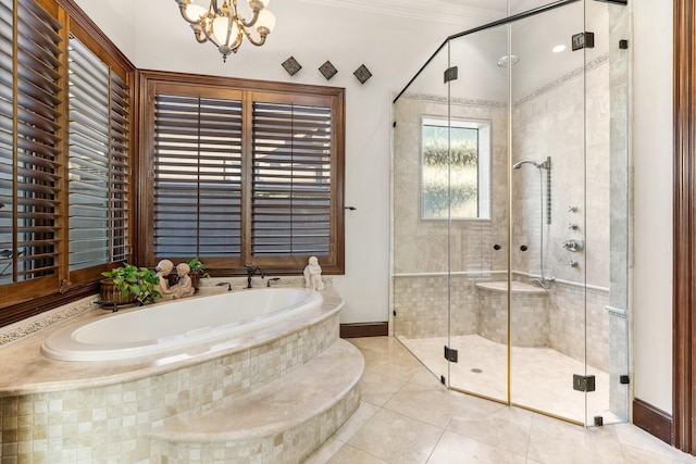 bathroom with plus walk in shower, tile patterned flooring, crown molding, and a notable chandelier