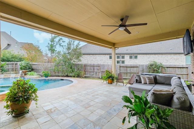 view of patio / terrace with a fenced in pool, ceiling fan, and an outdoor hangout area