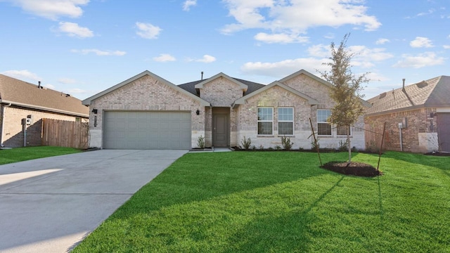 ranch-style home with a garage and a front lawn