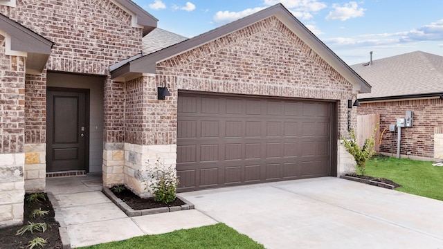 view of front of property featuring a garage